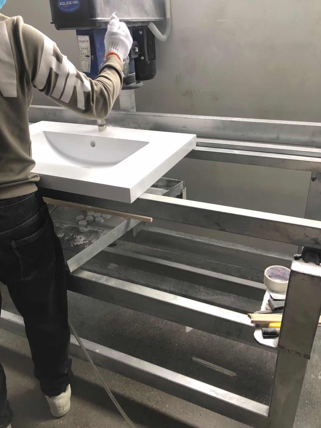 Drilling the faucet hole Drilling the faucet hole